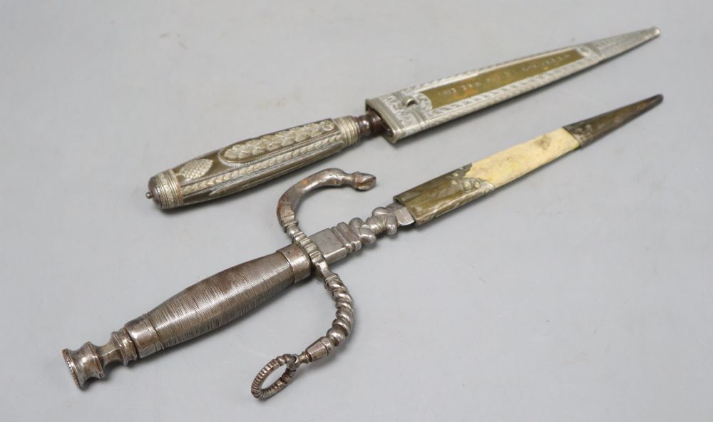An Italian 19th century dagger stiletto, engraved silver mounts, horn grip, brass sheath sides with inscription Di Coltello Perira Chi